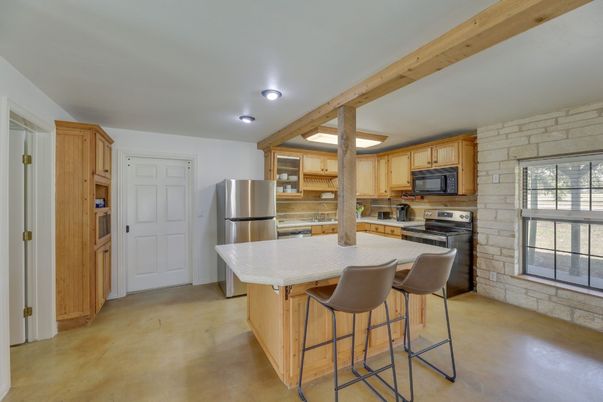 Interior, Kitchen, Recessed Lighting, Stainless Steel Appliances, Stone Walls, Wooden Beams