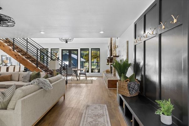 Dining room, Fireplace, Interior, Living room, Recessed Lighting, Wood Texture Flooring