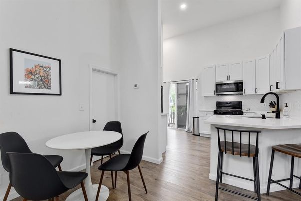 Dining room, Interior, Kitchen, Recessed Lighting, Stainless Steel Appliances, Wood Texture Flooring