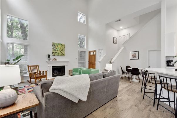 Dining room, Fireplace, Interior, Living room, Recessed Lighting, Wood Texture Flooring