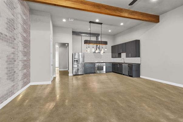 Interior, Kitchen, Pendant Lights, Recessed Lighting, Stainless Steel Appliances, Stone Walls, Wooden Beams