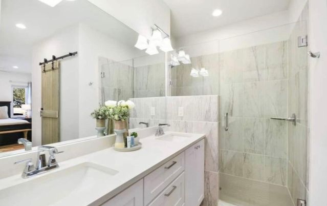 Bathroom, Dual Sink Vanities, Glass Shower, Interior, Marble Walls, Recessed Lighting