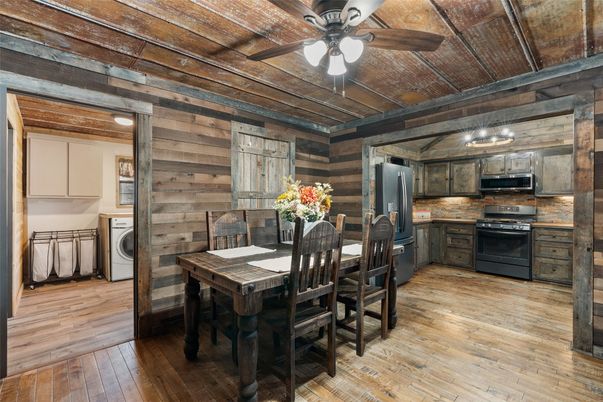 Dining room, Interior, Kitchen, Stainless Steel Appliances, Washer, Wooden Ceilings, Wood Texture Flooring, Wooden Walls