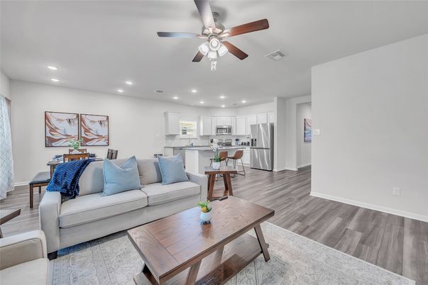 Dining room, Interior, Kitchen, Living room, Recessed Lighting, Stainless Steel Appliances, Wood Texture Flooring