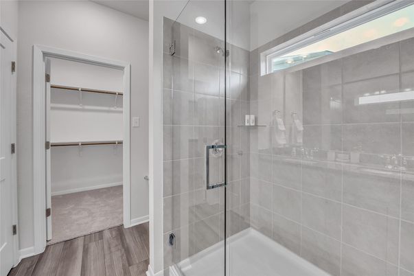 Bathroom, Glass Shower, Interior, Recessed Lighting, Walk-in Closets, Wood Texture Flooring