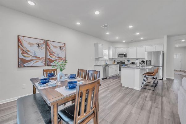 Dining room, Interior, Kitchen, Recessed Lighting, Stainless Steel Appliances, Wood Texture Flooring