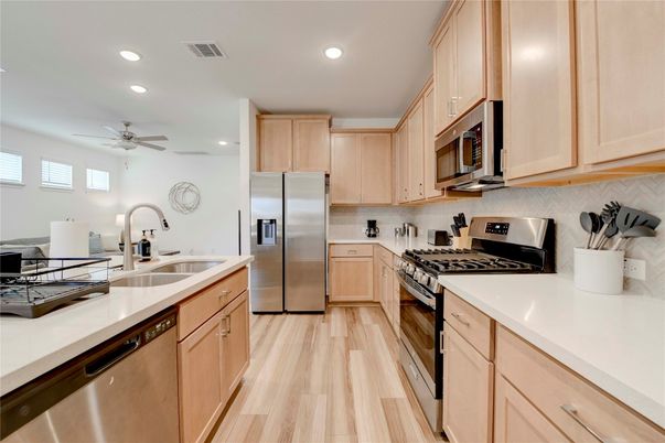 Interior, Kitchen, Recessed Lighting, Stainless Steel Appliances, Wood Texture Flooring