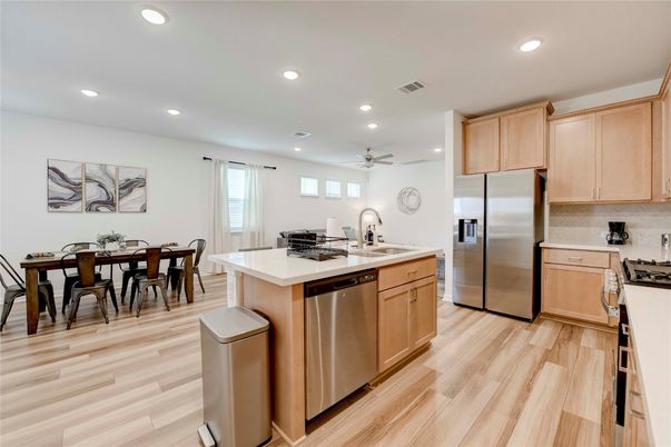 Dining room, Interior, Kitchen, Recessed Lighting, Stainless Steel Appliances, Wood Texture Flooring