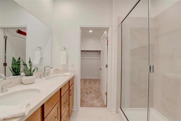 Bathroom, Dual Sink Vanities, Glass Shower, Interior, Recessed Lighting, Walk-in Closets