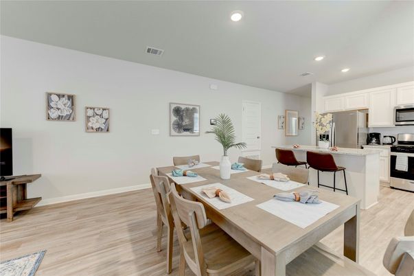 Dining room, Interior, Kitchen, Living room, Recessed Lighting, Stainless Steel Appliances, Wood Texture Flooring