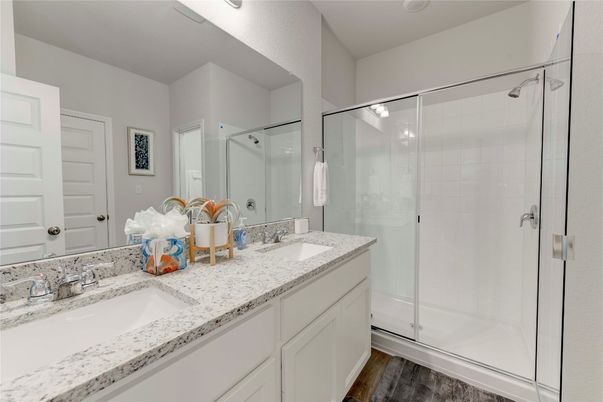 Bathroom, Dual Sink Vanities, Glass Shower, Interior, Wood Texture Flooring