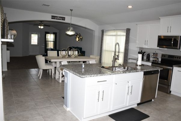 Chandelier, Dining room, Interior, Kitchen, Recessed Lighting, Stainless Steel Appliances