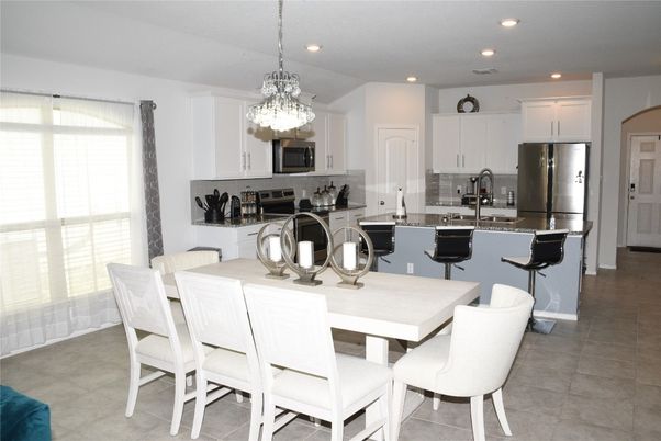 Chandelier, Dining room, Interior, Kitchen, Pendant Lights, Recessed Lighting, Stainless Steel Appliances