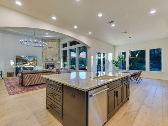 Chandelier, Dining room, Fireplace, Interior, Kitchen, Living room, Pendant Lights, Recessed Lighting, Stone Walls, Wood Texture Flooring