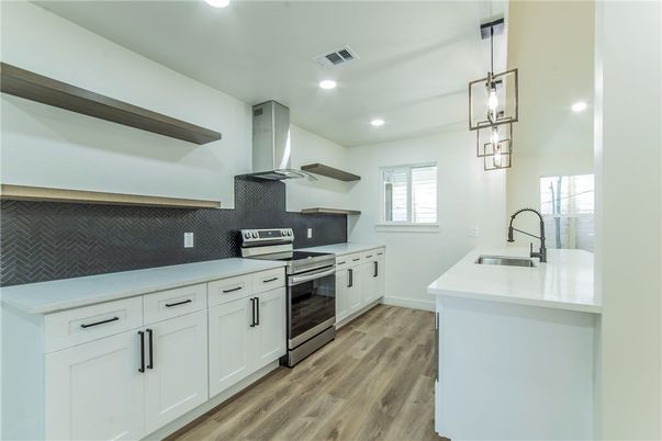Interior, Kitchen, Pendant Lights, Recessed Lighting, Stainless Steel Appliances, Wood Texture Flooring