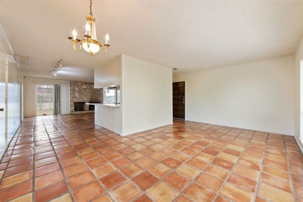 Chandelier, Empty room, Fireplace, Interior, Pendant Lights, Stone Walls
