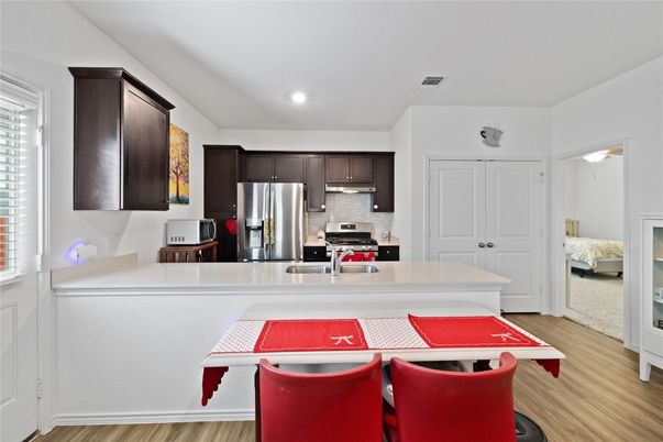 Interior, Kitchen, Recessed Lighting, Stainless Steel Appliances, Wood Texture Flooring