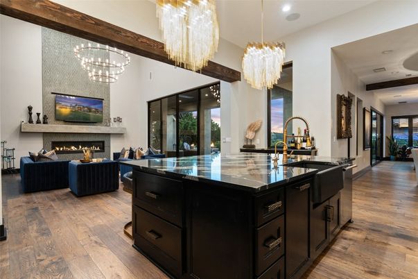 Chandelier, Fireplace, Interior, Kitchen, Living room, Recessed Lighting, Wood Texture Flooring