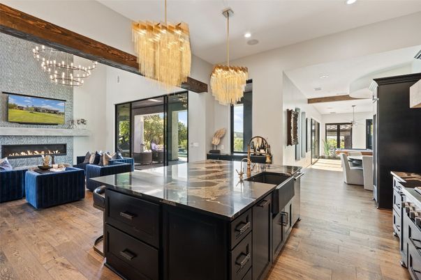 Chandelier, Dining room, Fireplace, Interior, Kitchen, Living room, Pendant Lights, Recessed Lighting, Wood Texture Flooring