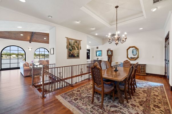 Chandelier, Dining room, Interior, Living room, Recessed Lighting, Wooden Beams, Wooden Ceilings, Wood Texture Flooring
