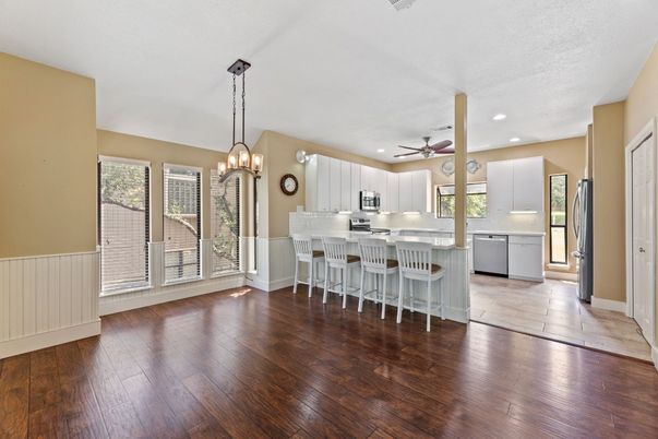 Chandelier, Interior, Kitchen, Pendant Lights, Recessed Lighting, Stainless Steel Appliances, Wood Texture Flooring