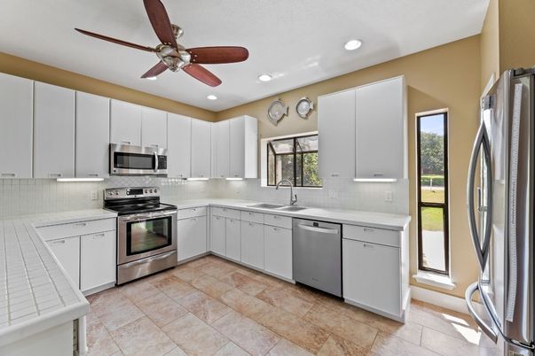 Interior, Kitchen, Recessed Lighting, Stainless Steel Appliances, Tile Countertops