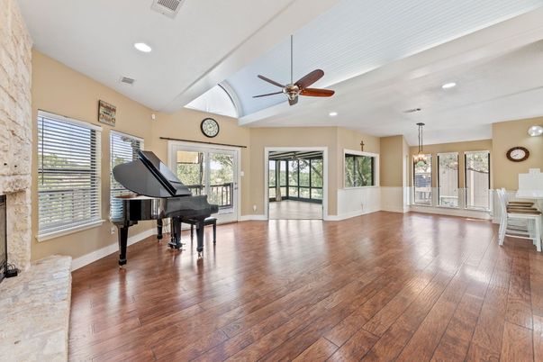 Fireplace, Interior, Pendant Lights, Piano, Recessed Lighting, Wood Texture Flooring
