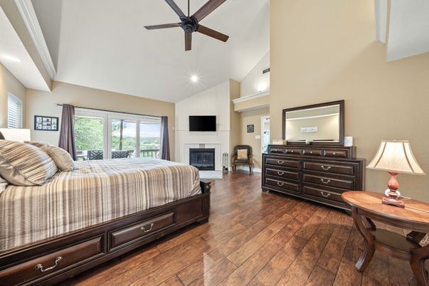 Bedroom, Fireplace, Interior, Recessed Lighting, Wood Texture Flooring