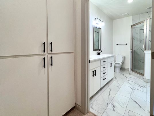 Bathroom, Dual Sink Vanities, Glass Shower, Interior, Marble, Recessed Lighting