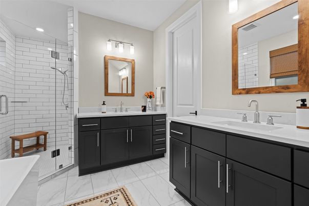 Bathroom, Dual Sink Vanities, Glass Shower, Interior, Marble, Recessed Lighting
