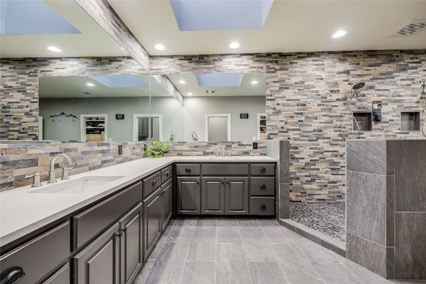Bathroom, Dual Sink Vanities, Interior, Recessed Lighting, Stone Walls