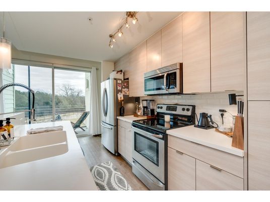 Interior, Kitchen, Stainless Steel Appliances, Washer, Wood Texture Flooring