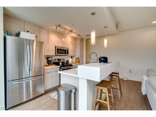 Interior, Kitchen, Pendant Lights, Recessed Lighting, Stainless Steel Appliances, Wood Texture Flooring