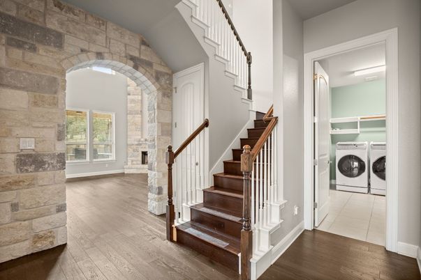 Fireplace, Interior, Stone Walls, Utility Closets, Washer, Wood Texture Flooring