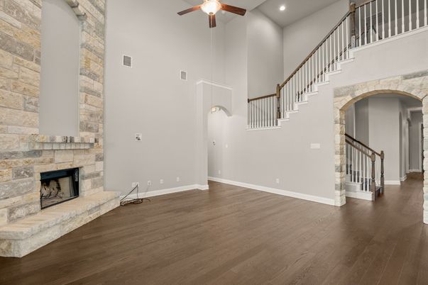 Fireplace, Interior, Recessed Lighting, Stone Walls, Wood Texture Flooring