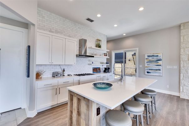 Interior, Kitchen, Recessed Lighting, Stainless Steel Appliances, Stone Walls, Wood Texture Flooring