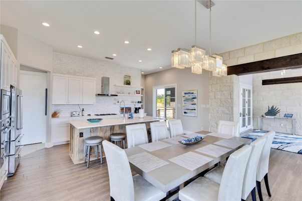 Chandelier, Dining room, Interior, Kitchen, Recessed Lighting, Stainless Steel Appliances, Wood Texture Flooring