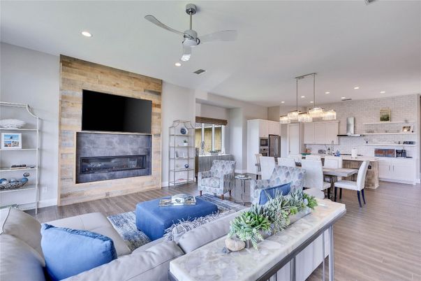 Dining room, Fireplace, Interior, Kitchen, Living room, Pendant Lights, Recessed Lighting, Stainless Steel Appliances, Wood Texture Flooring, Wooden Walls