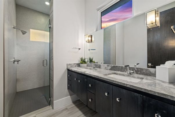 Bathroom, Dual Sink Vanities, Glass Shower, Interior, Recessed Lighting, Wood Texture Flooring