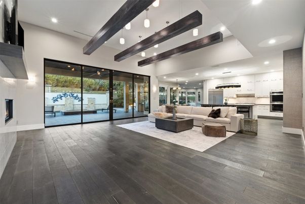 Fireplace, Interior, Kitchen, Living room, Pendant Lights, Recessed Lighting, Stainless Steel Appliances, Wood Texture Flooring
