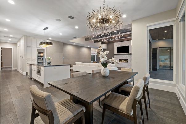 Dining room, Fireplace, Interior, Kitchen, Living room, Pendant Lights, Recessed Lighting, Stainless Steel Appliances, Wood Texture Flooring