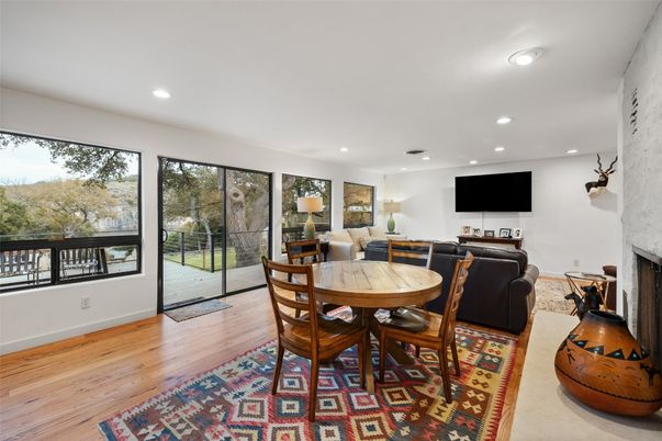 Dining room, Fireplace, Interior, Living room, Recessed Lighting, Wood Texture Flooring
