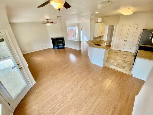 Empty room, Fireplace, Interior, Pendant Lights, Recessed Lighting, Wood Texture Flooring