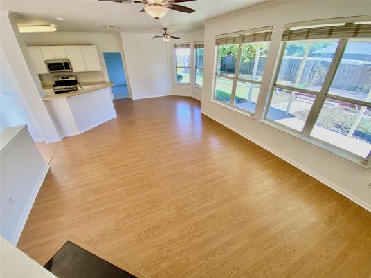 Empty room, Interior, Kitchen, Stainless Steel Appliances, Wood Texture Flooring