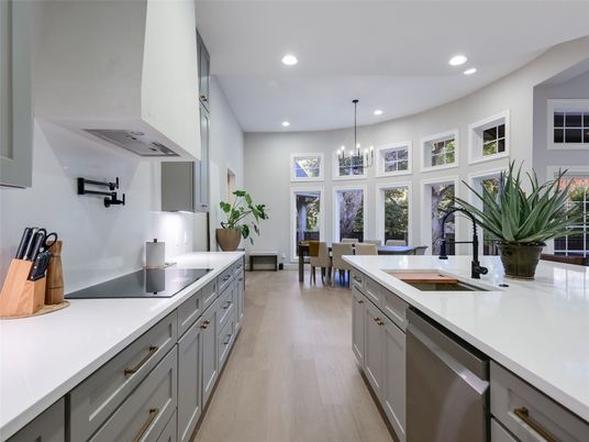 Chandelier, Dining room, Interior, Kitchen, Pendant Lights, Recessed Lighting, Stainless Steel Appliances, Wood Texture Flooring
