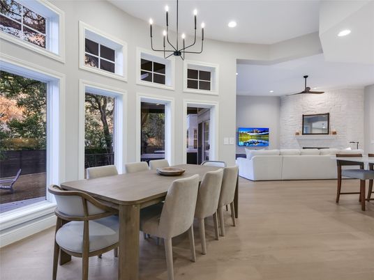 Chandelier, Dining room, Fireplace, Interior, Living room, Recessed Lighting, Stone Walls, Wood Texture Flooring