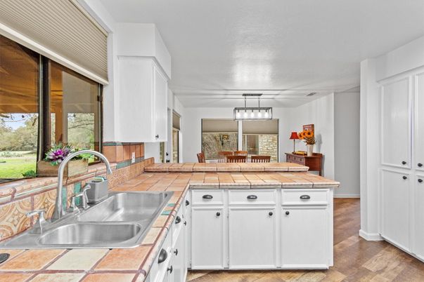 Dining room, Interior, Kitchen, Pendant Lights, Tile Countertops, Wood Texture Flooring