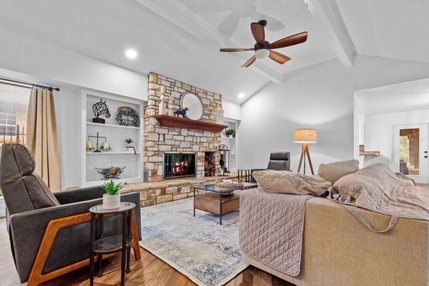 Fireplace, Interior, Living room, Recessed Lighting, Stone Walls, Wood Texture Flooring