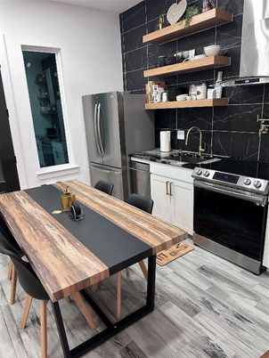 Dining room, Interior, Kitchen, Marble Walls, Stainless Steel Appliances, Wood Texture Flooring