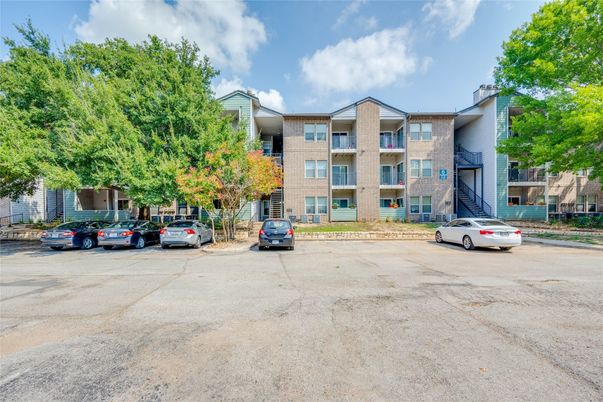 Exterior, Facade, Brick Facade, Condo Building
